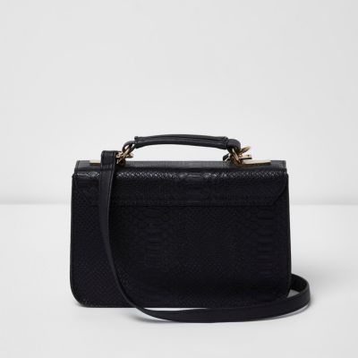 Black embossed mini satchel bag